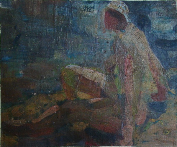 Фигура сидящей женщины.